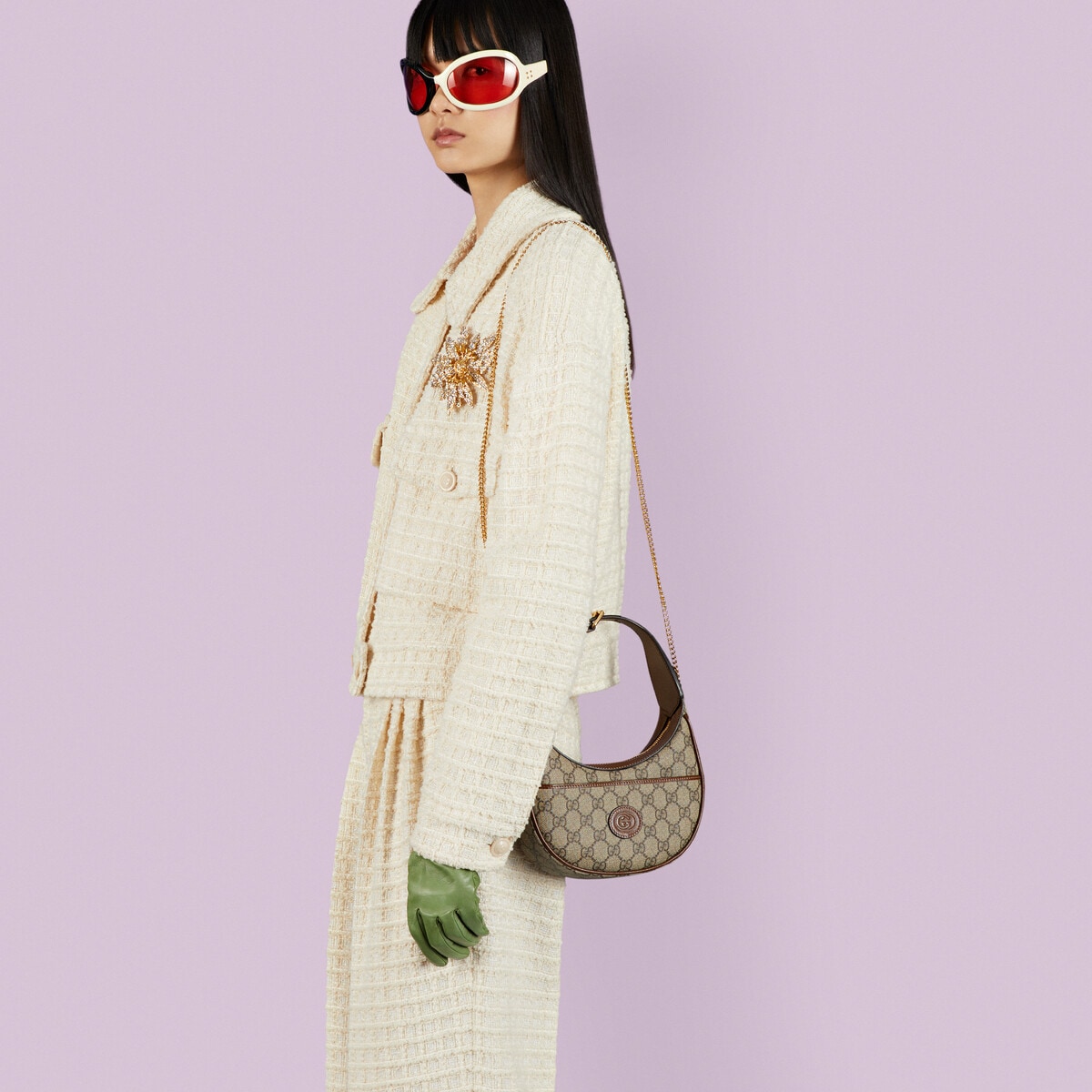 Half-moon-shaped mini bag with Interlocking