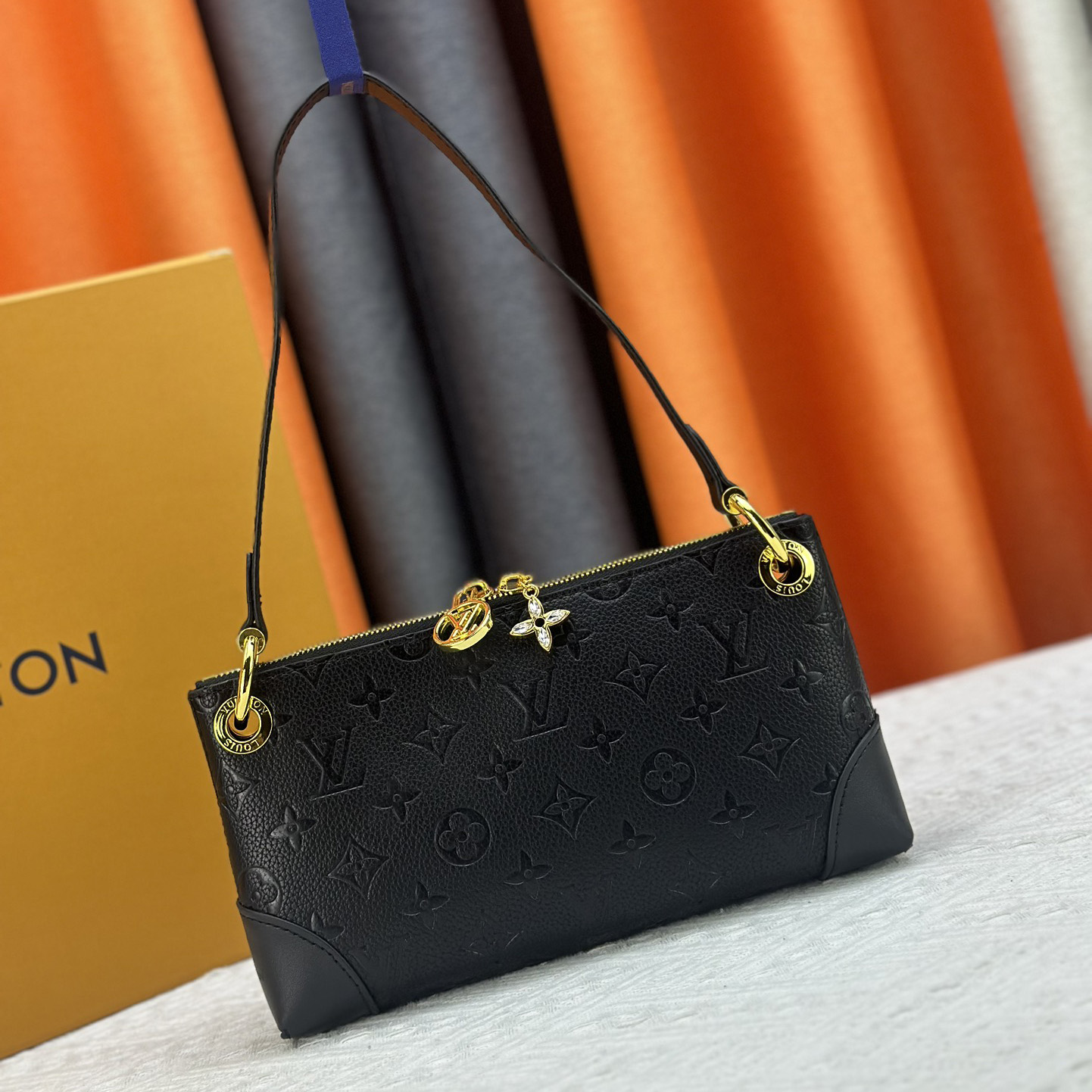 LV armpit shoulder bag