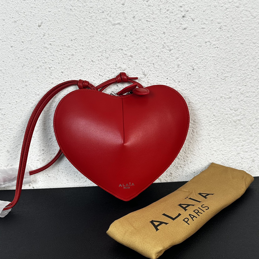 ALAIA Le Coeur heart-shaped leather cross-body bag