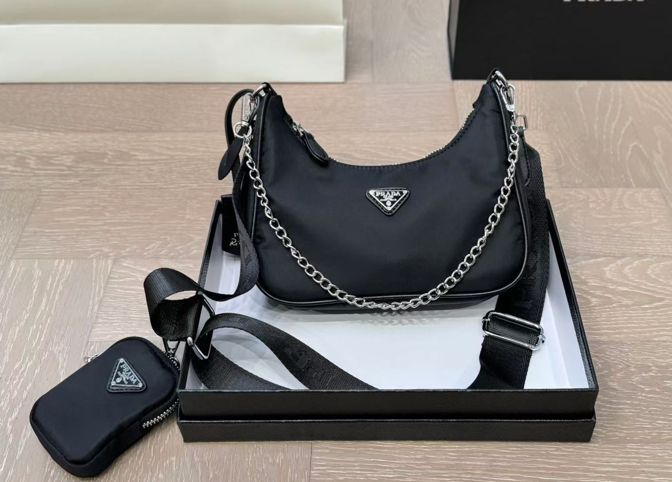 LV backpacks and Prada bag