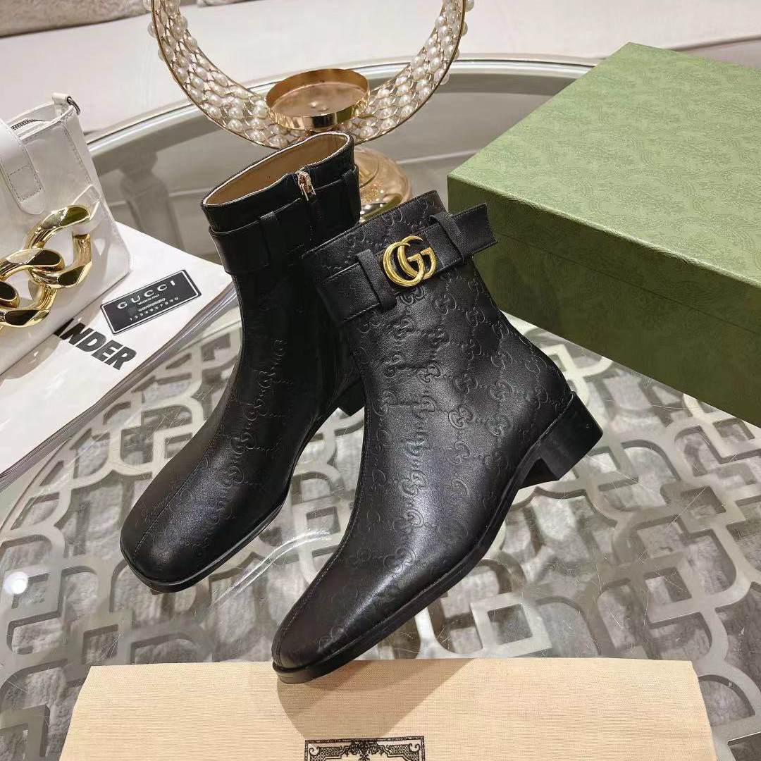 Gucci embossed boots