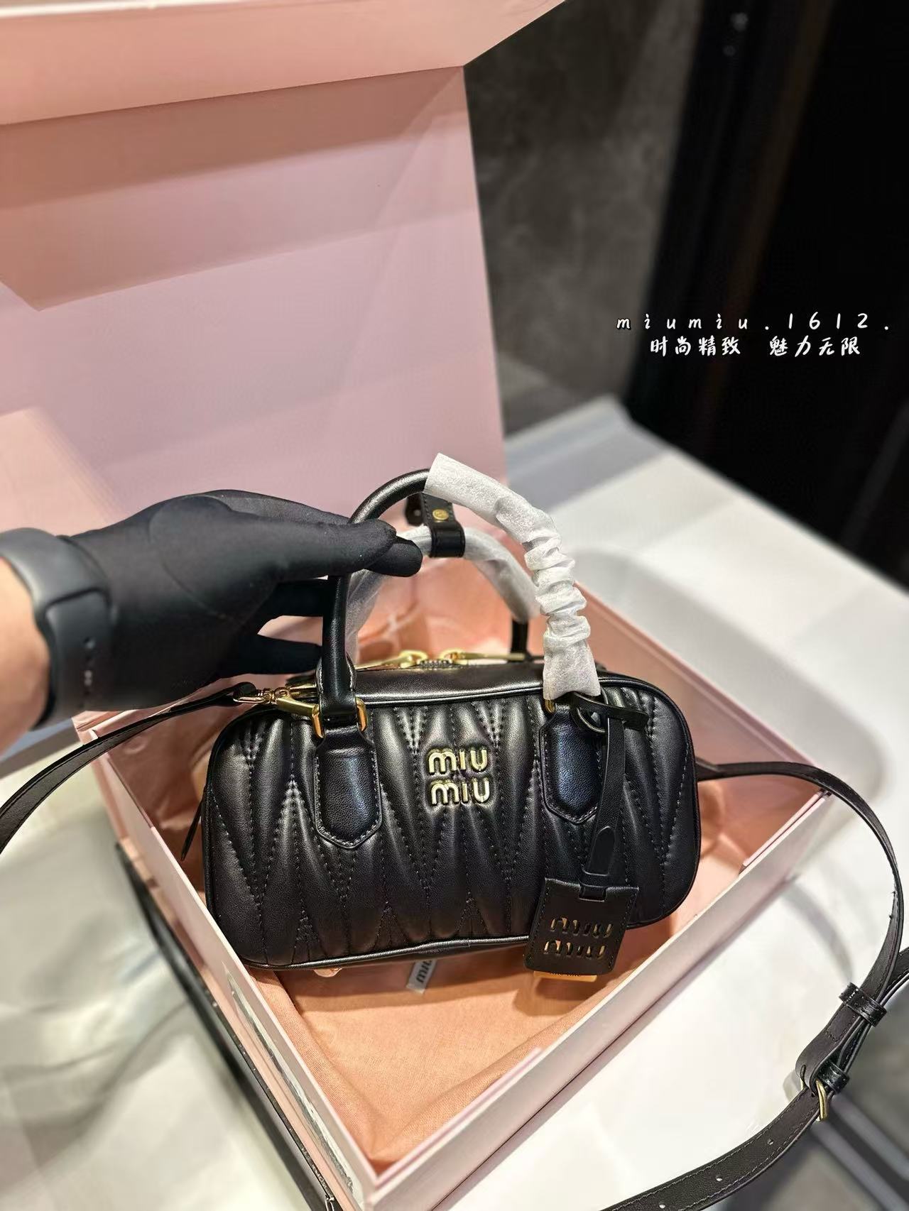 Miumiu Aracdie pleated bowling bag