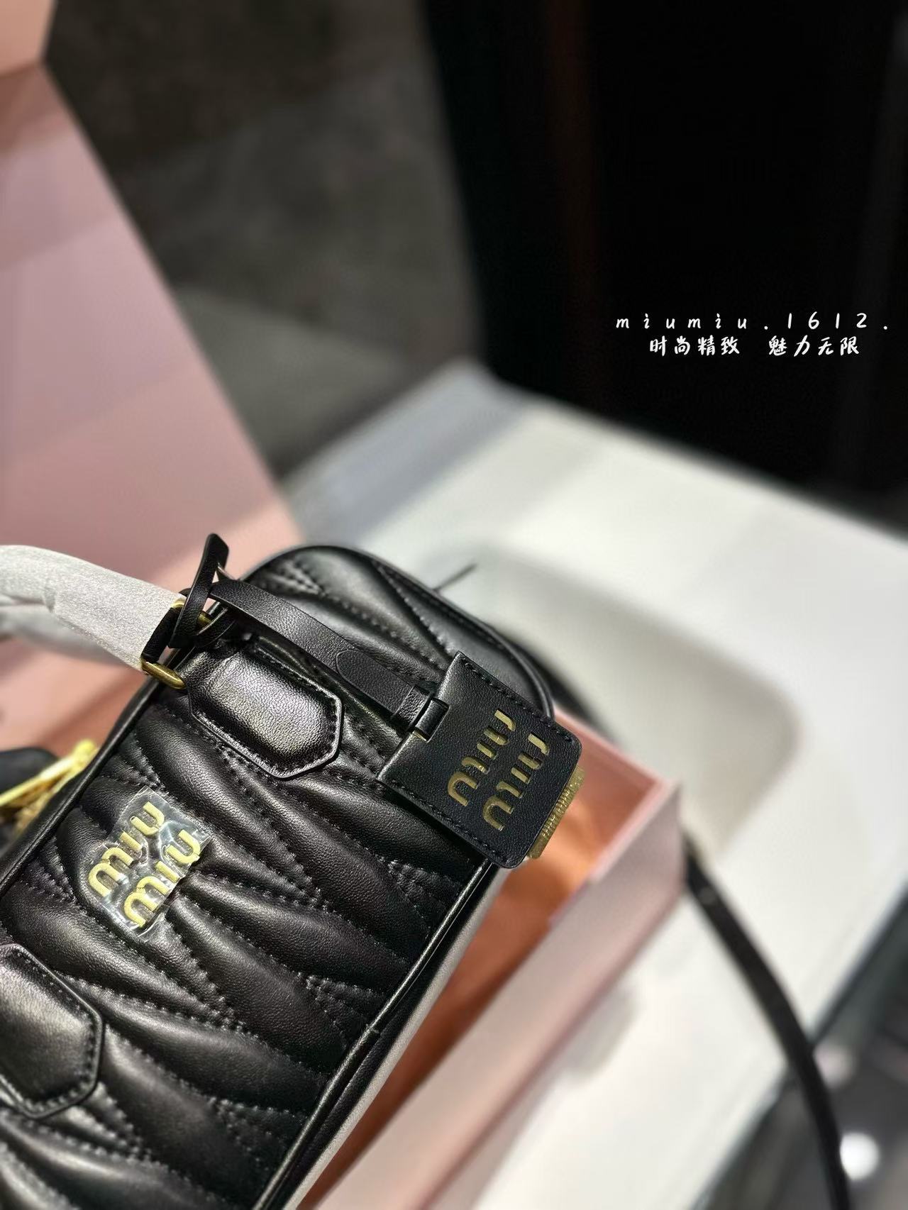 Miumiu Aracdie pleated bowling bag