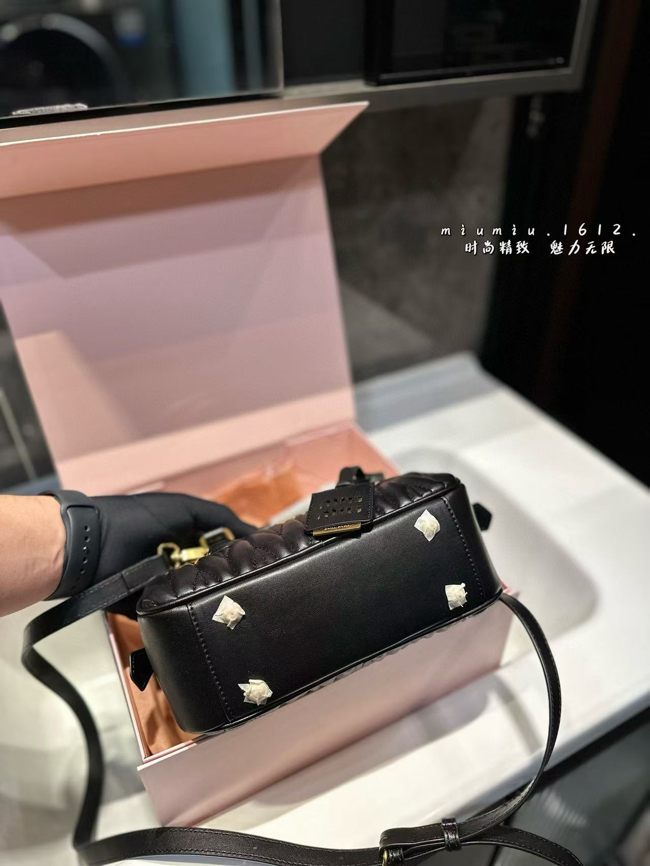 Miumiu Aracdie pleated bowling bag