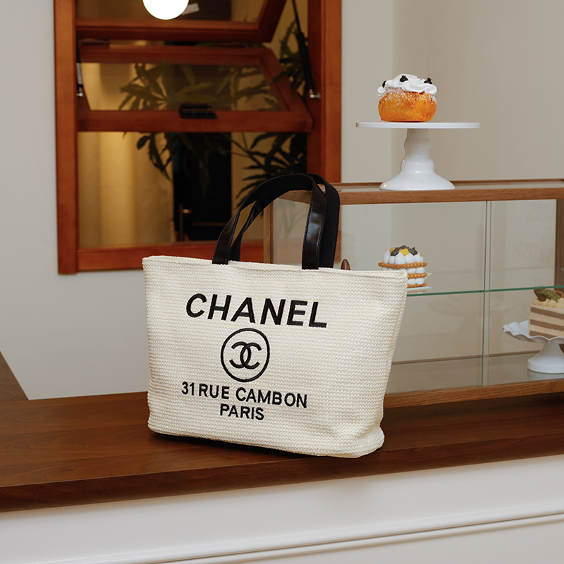 Chanel shoulder handheld beach bag woven shopping bag travel bag
