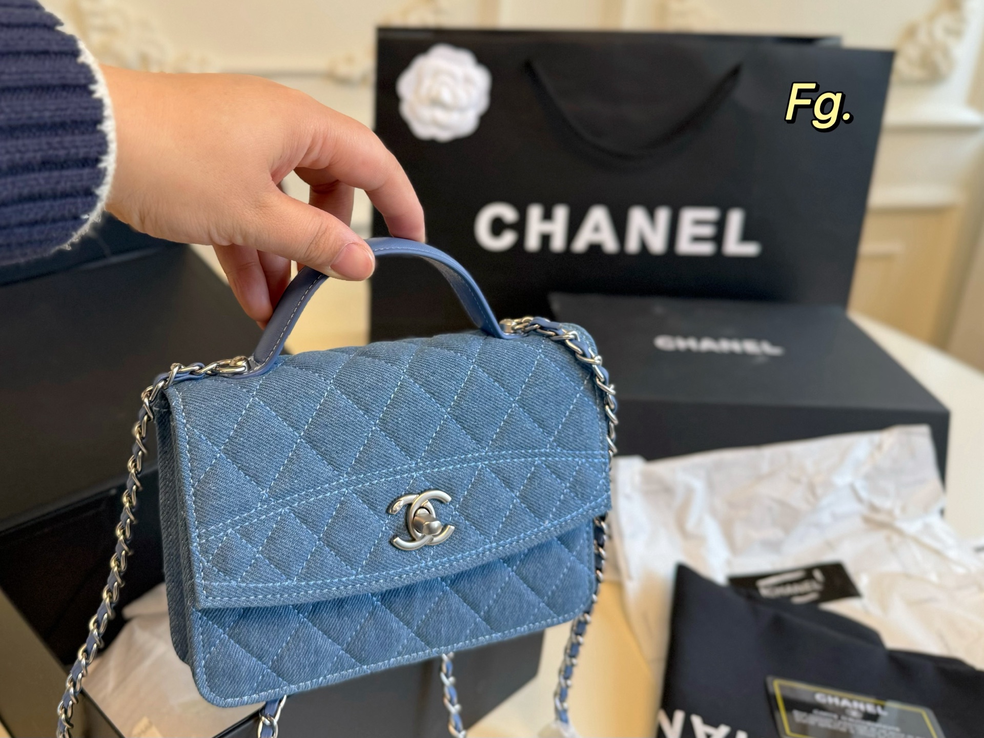 Chanel new denim hand-held backpack chain bag