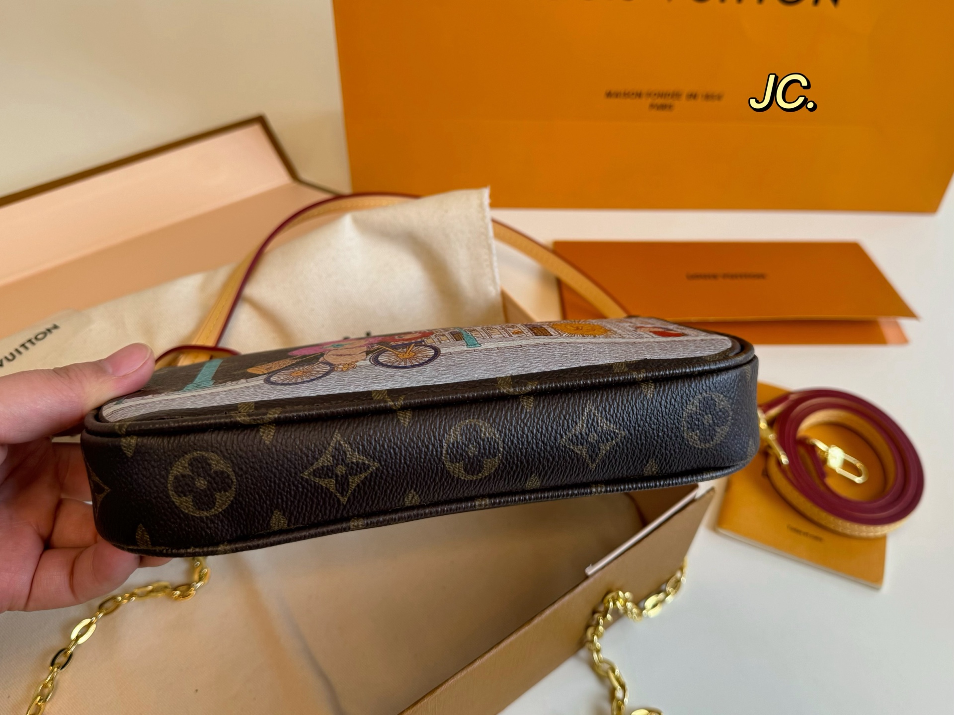 Louis Vuitton's new graffiti chain mahjong bag