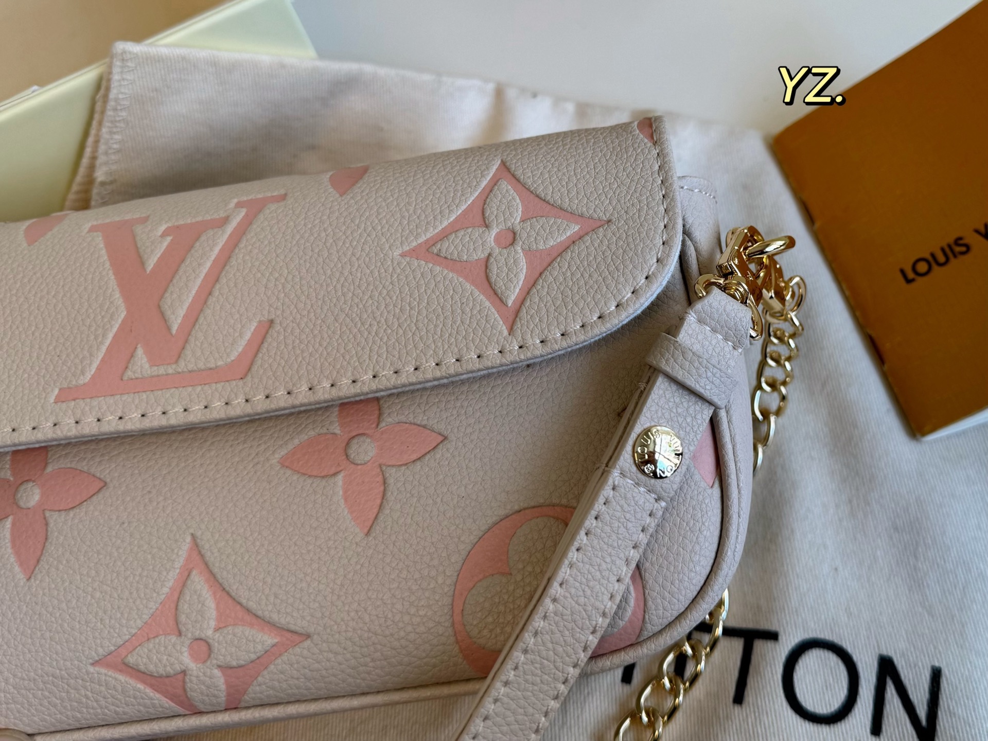 Louis Vuitton embossed mahjong bag armpit bag