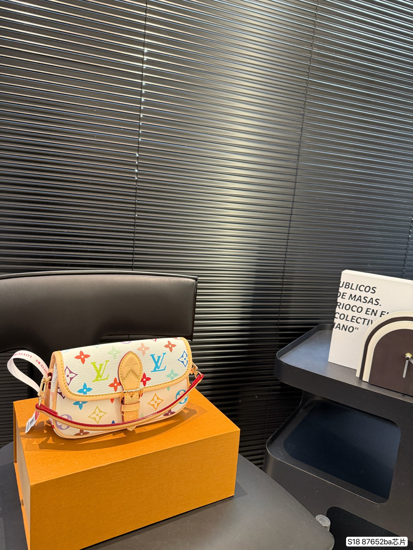Louis Vuitton's worldly white three-color cross-body handbag is playful and cute