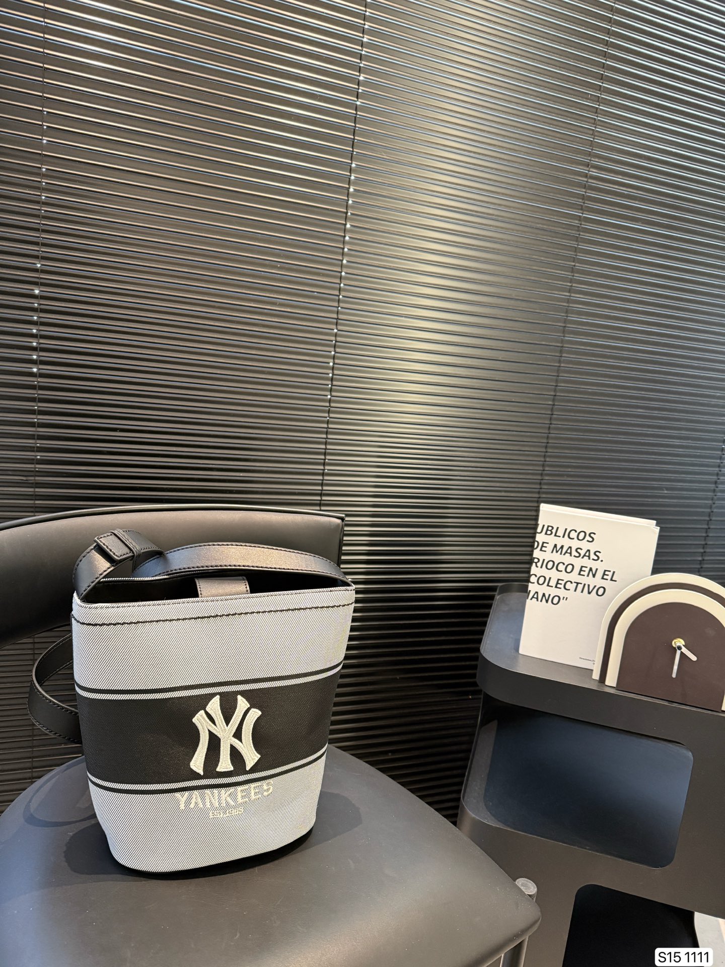 MLB bucket bag is practical and versatile crescent shape