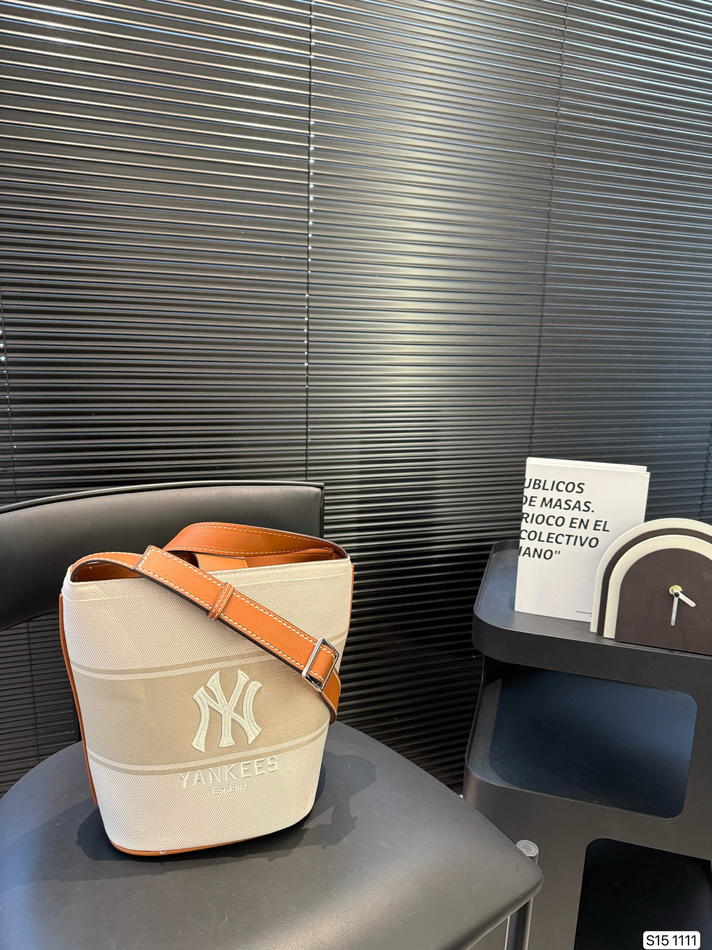 MLB bucket bag is practical and versatile crescent shape