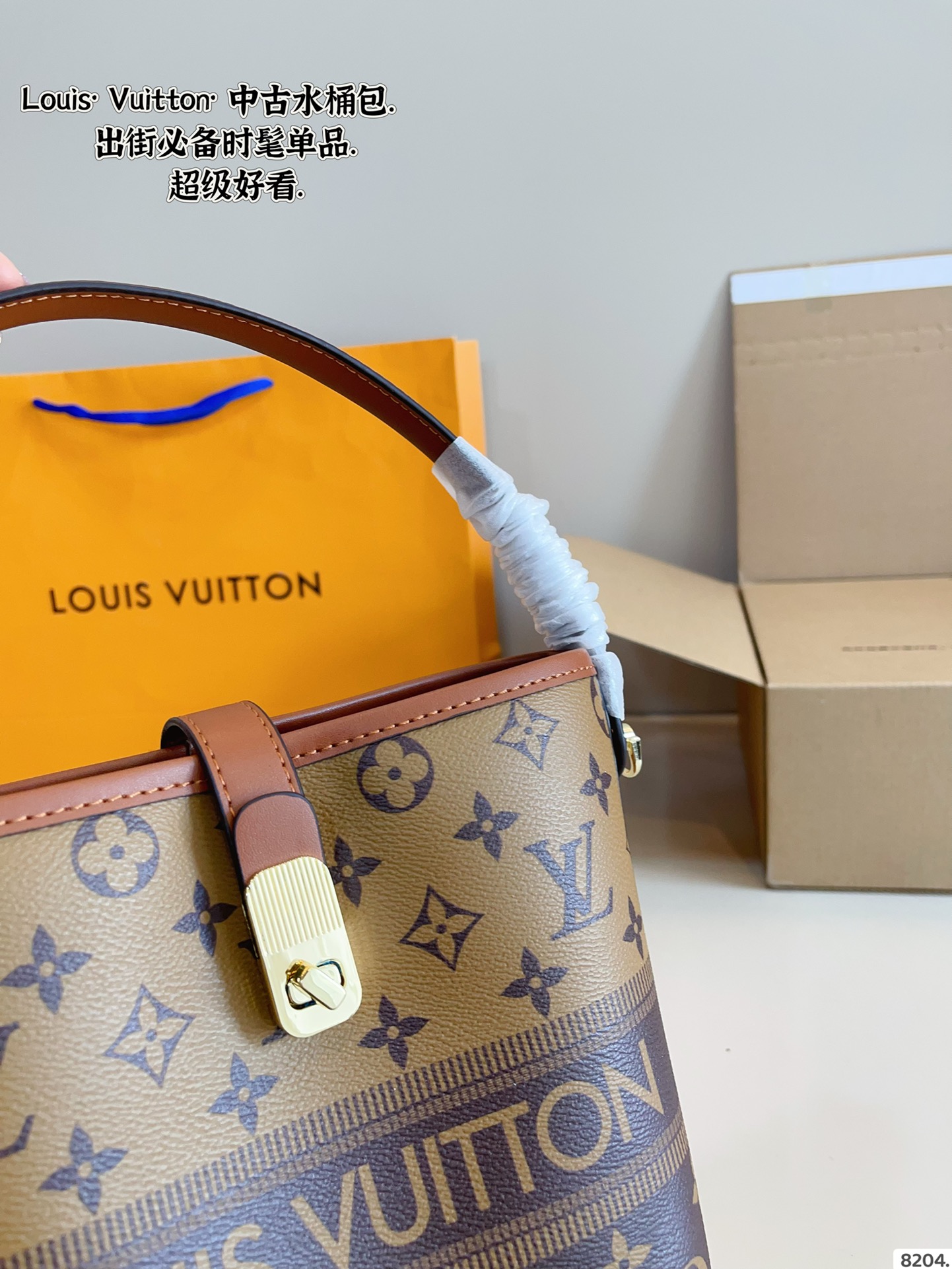 LV bucket bag is compact for daily commuting