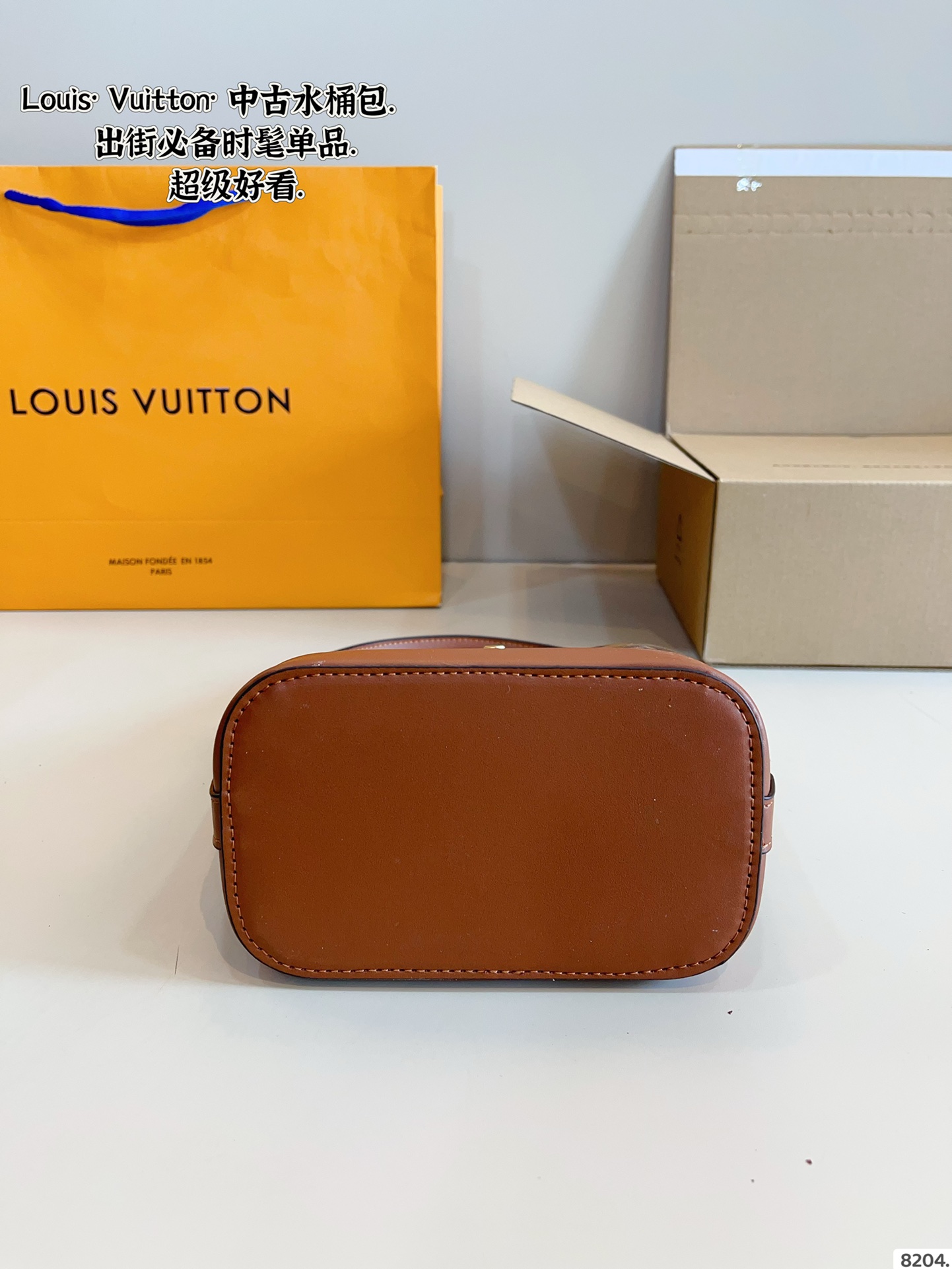 LV bucket bag is compact for daily commuting