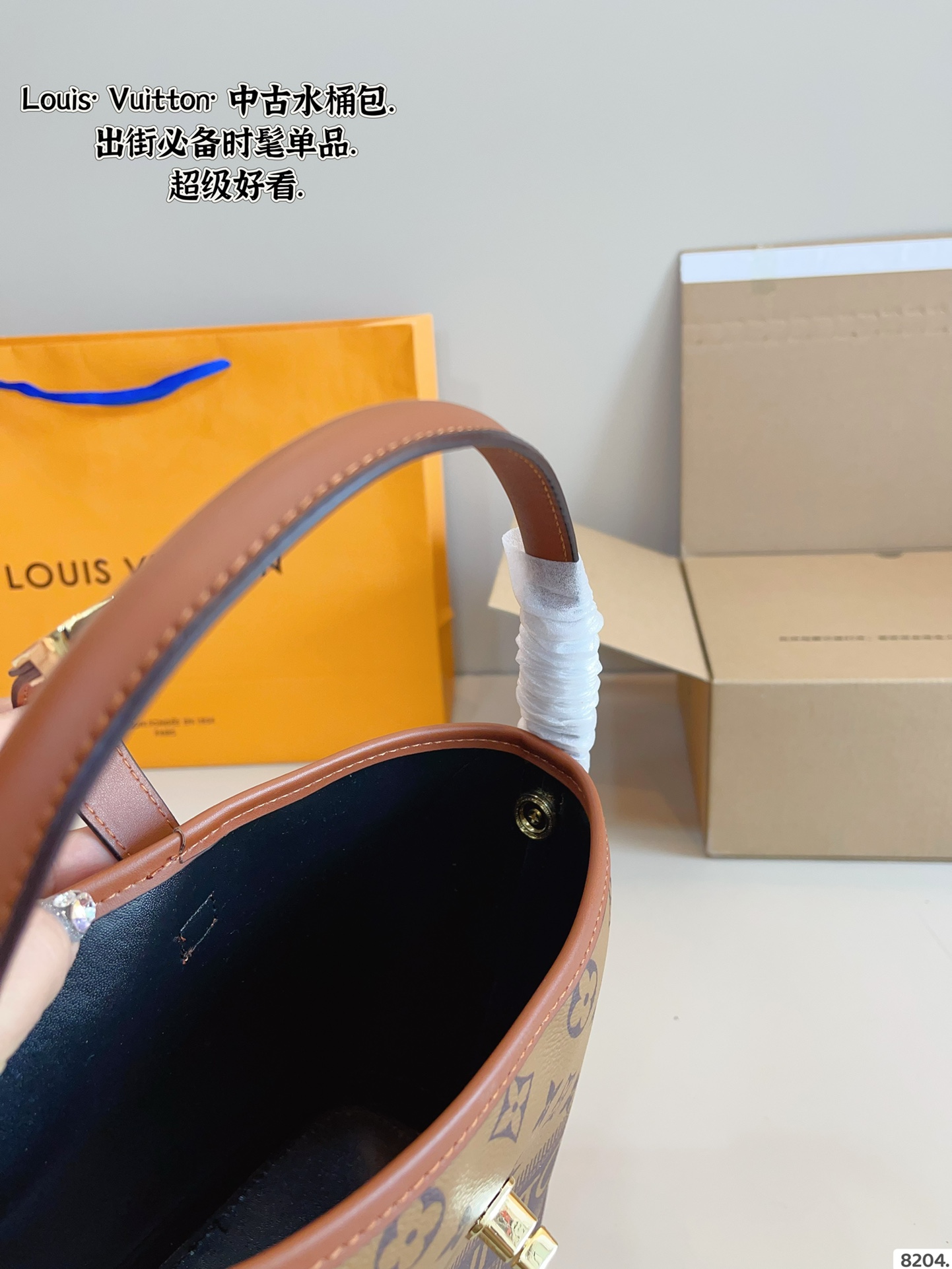 LV bucket bag is compact for daily commuting