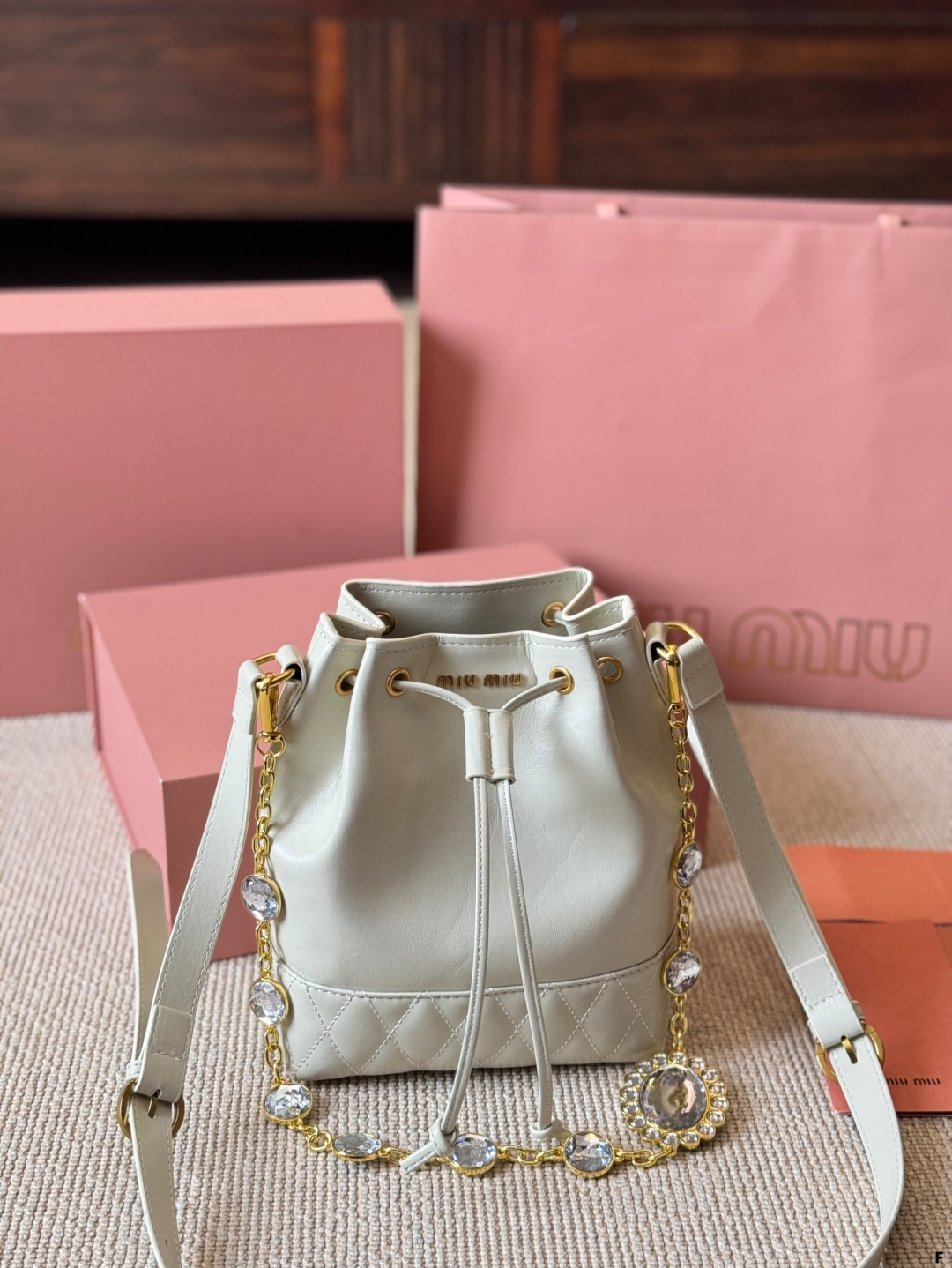 MiuMiu waxed leather small bucket bag