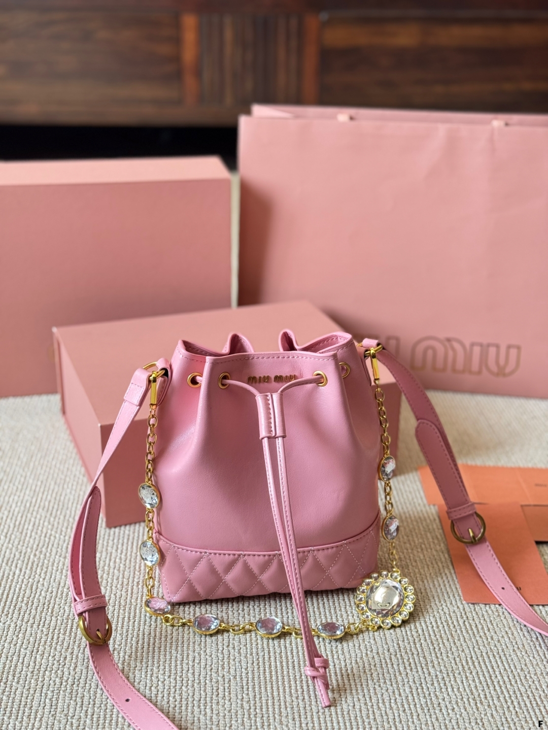 MiuMiu waxed leather small bucket bag
