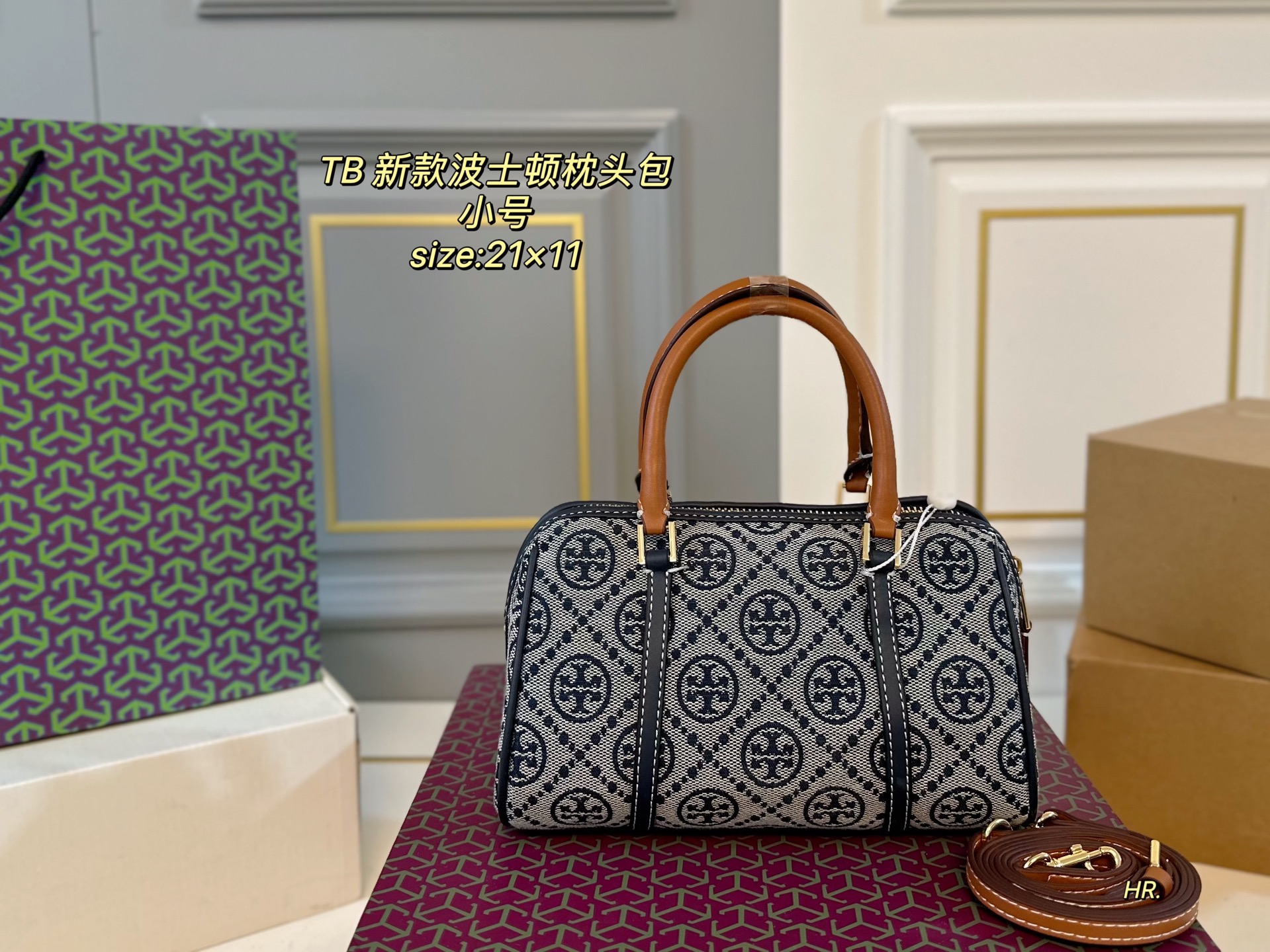 Tory Burch's new canvas monogram Boston pillow bag
