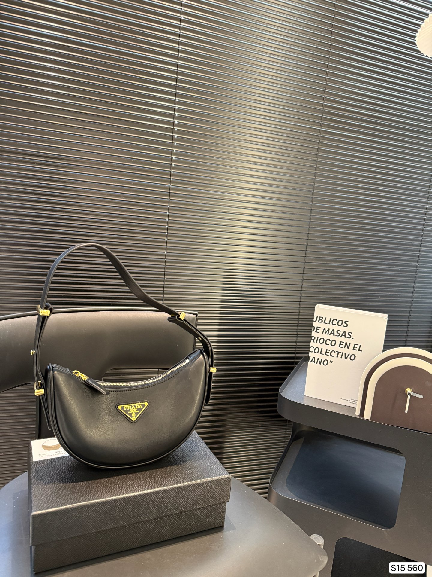 Prada underarm bag is simple and stylish