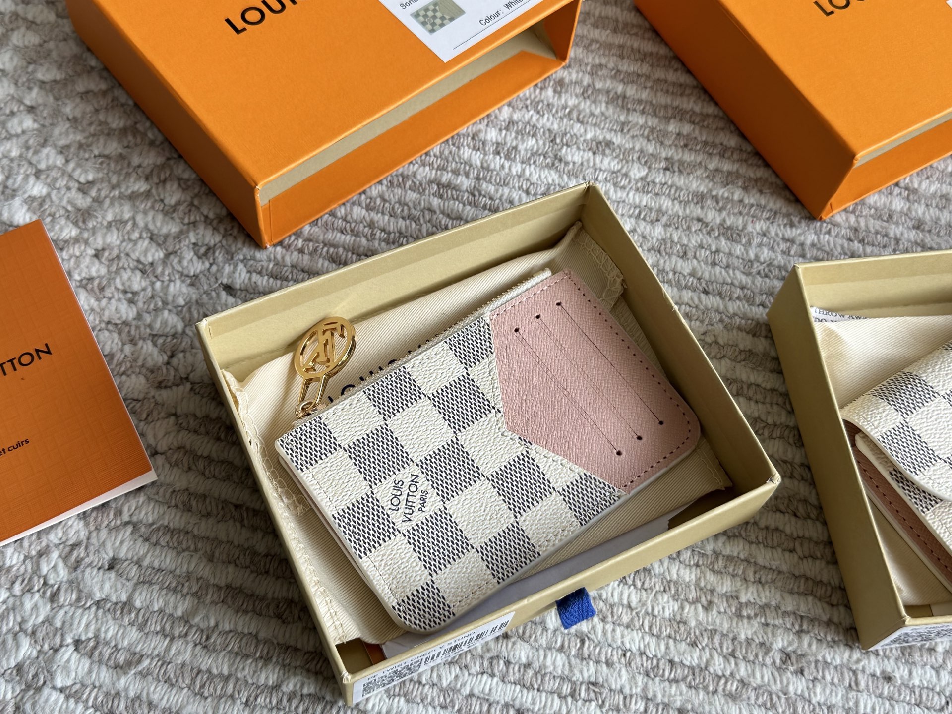 LV white coin purse