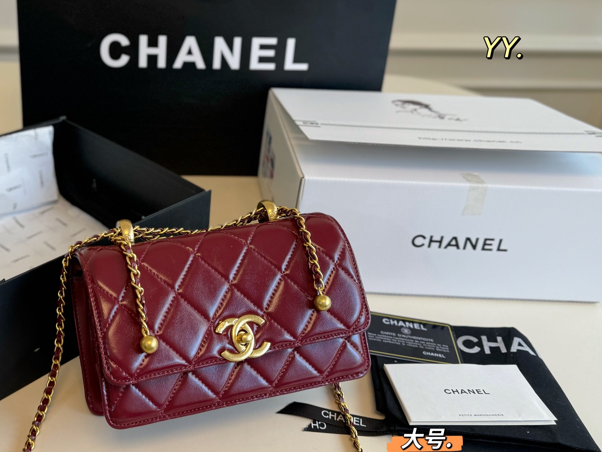 Chanel's new drawstring double gold bead bag