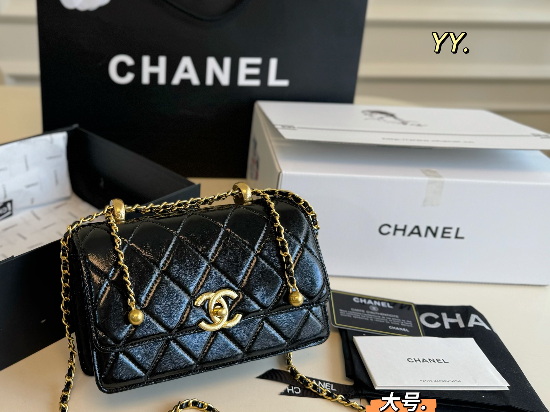 Chanel's new drawstring double gold bead bag