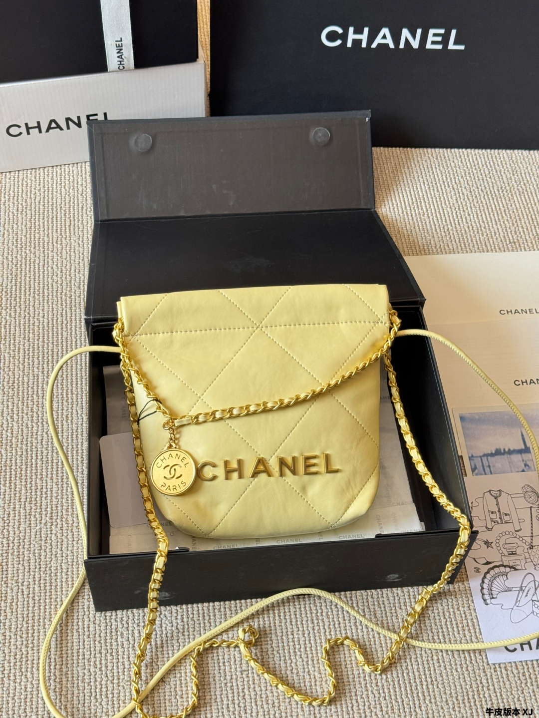 Chanel gold coin trash bag