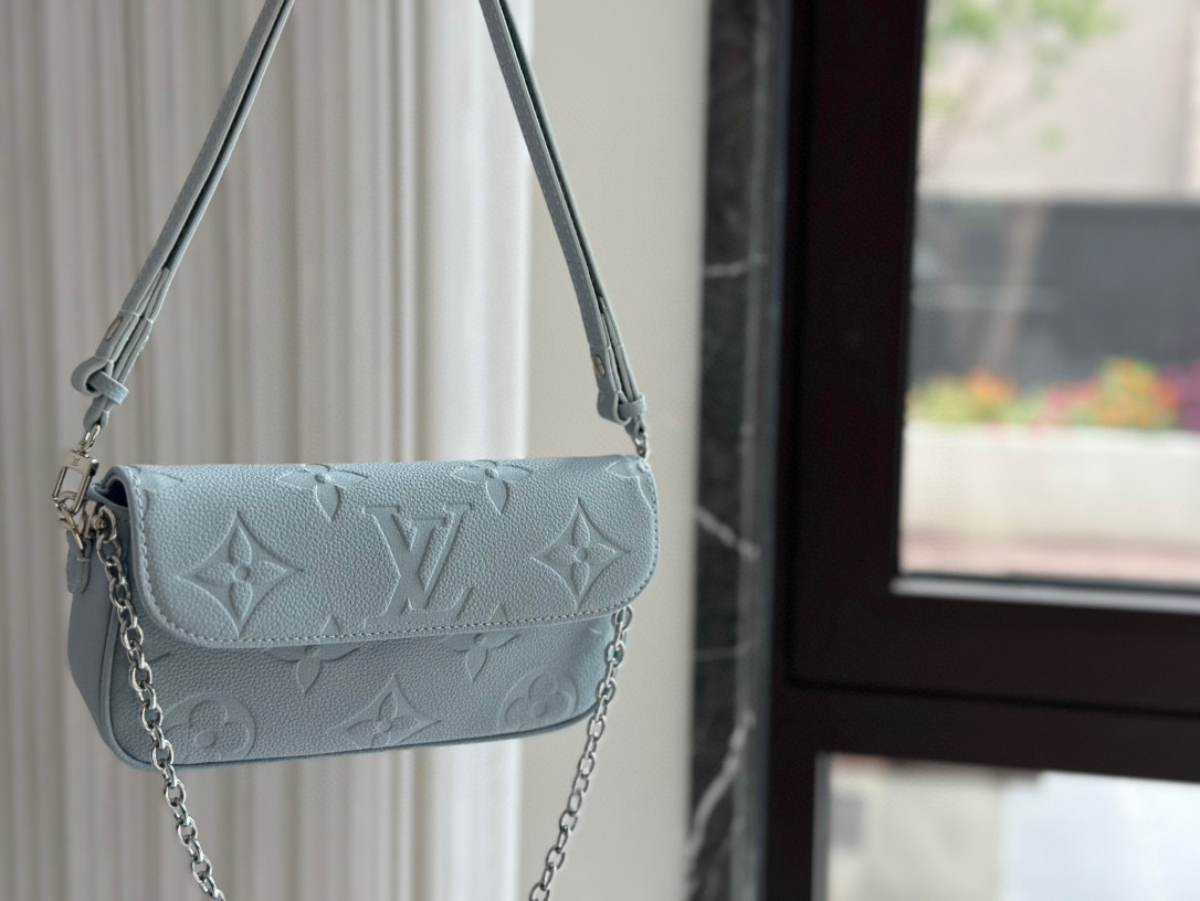 LV blue ivy woc mahjong bag