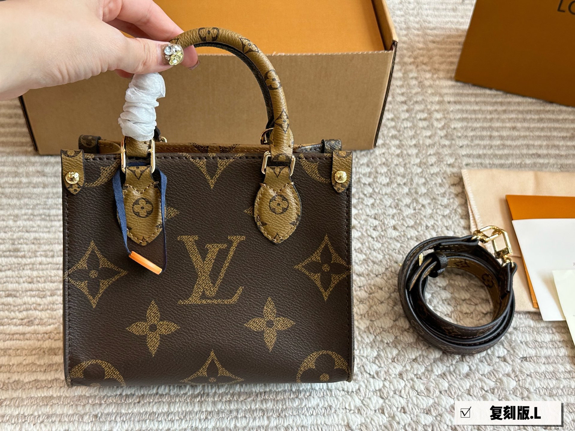 LV onthego shopping bag