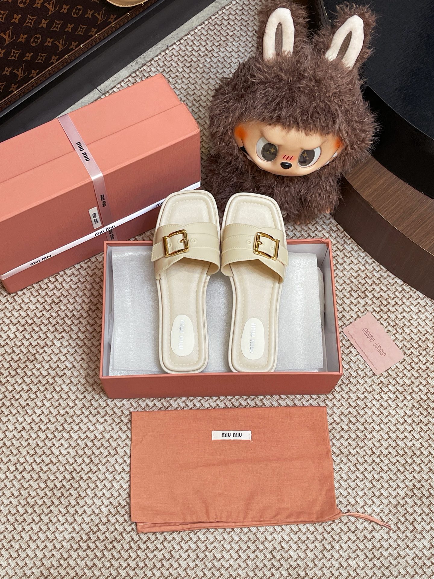 Miumiu metal buckle slippers