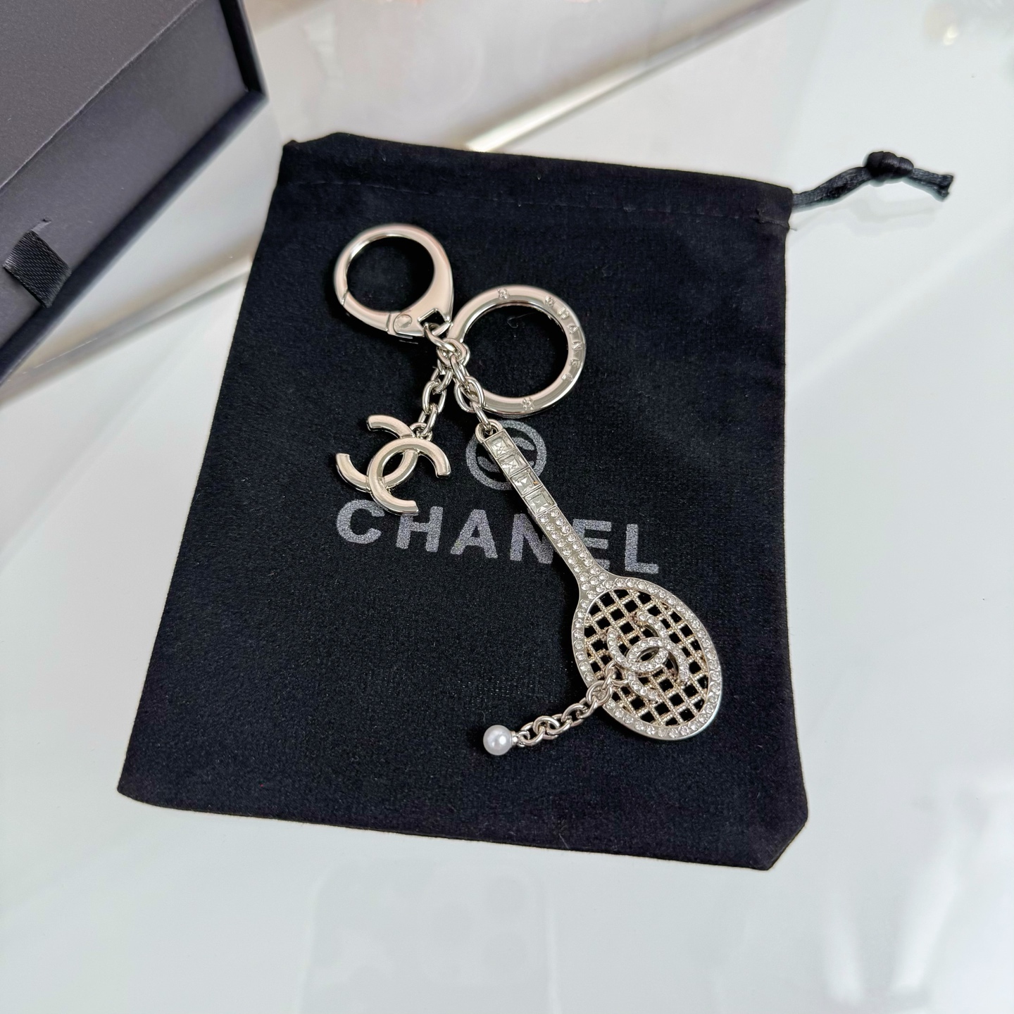 Chanel tennis racket pendant keychain