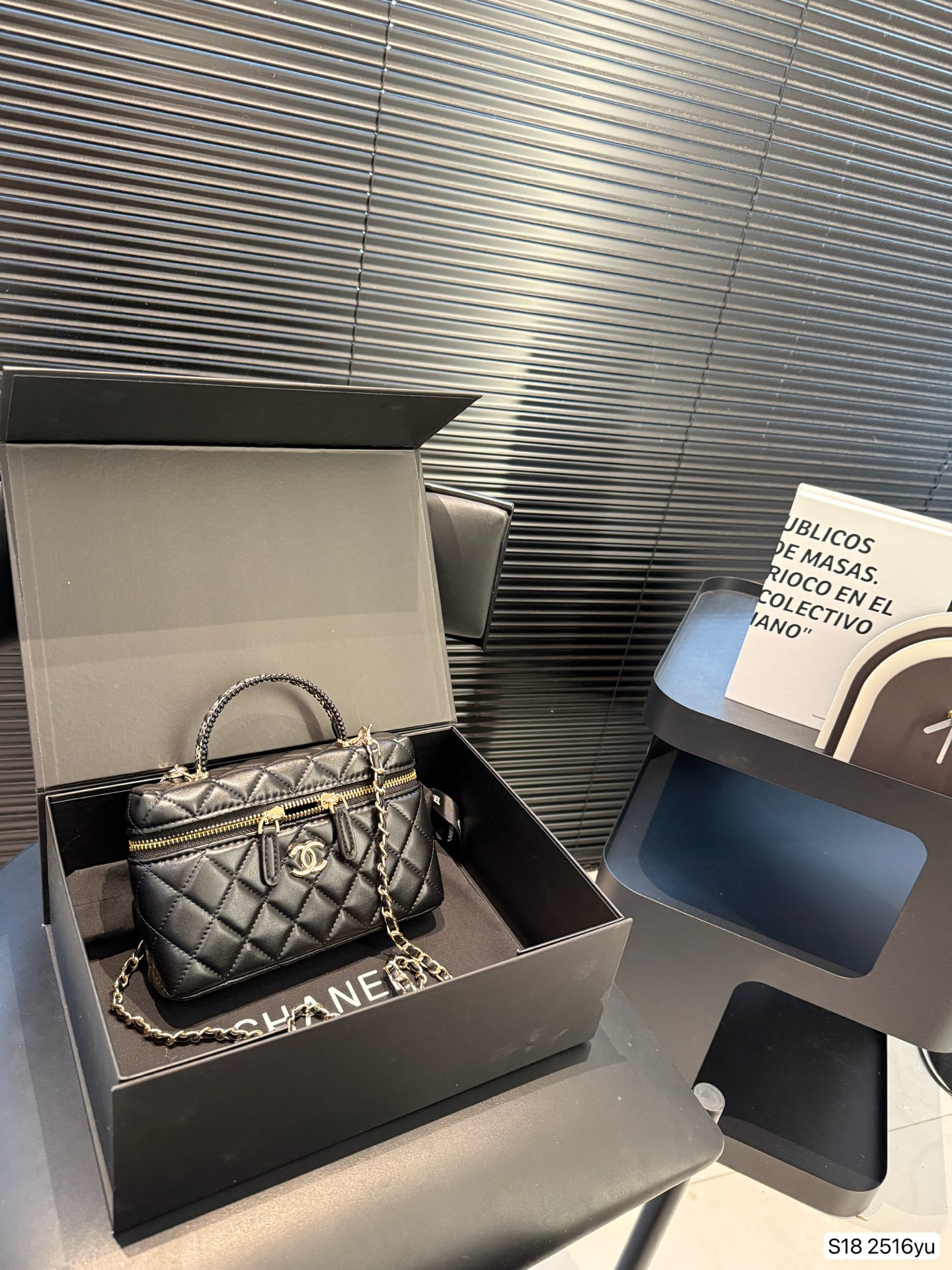 Chanel hand-held cosmetic bag