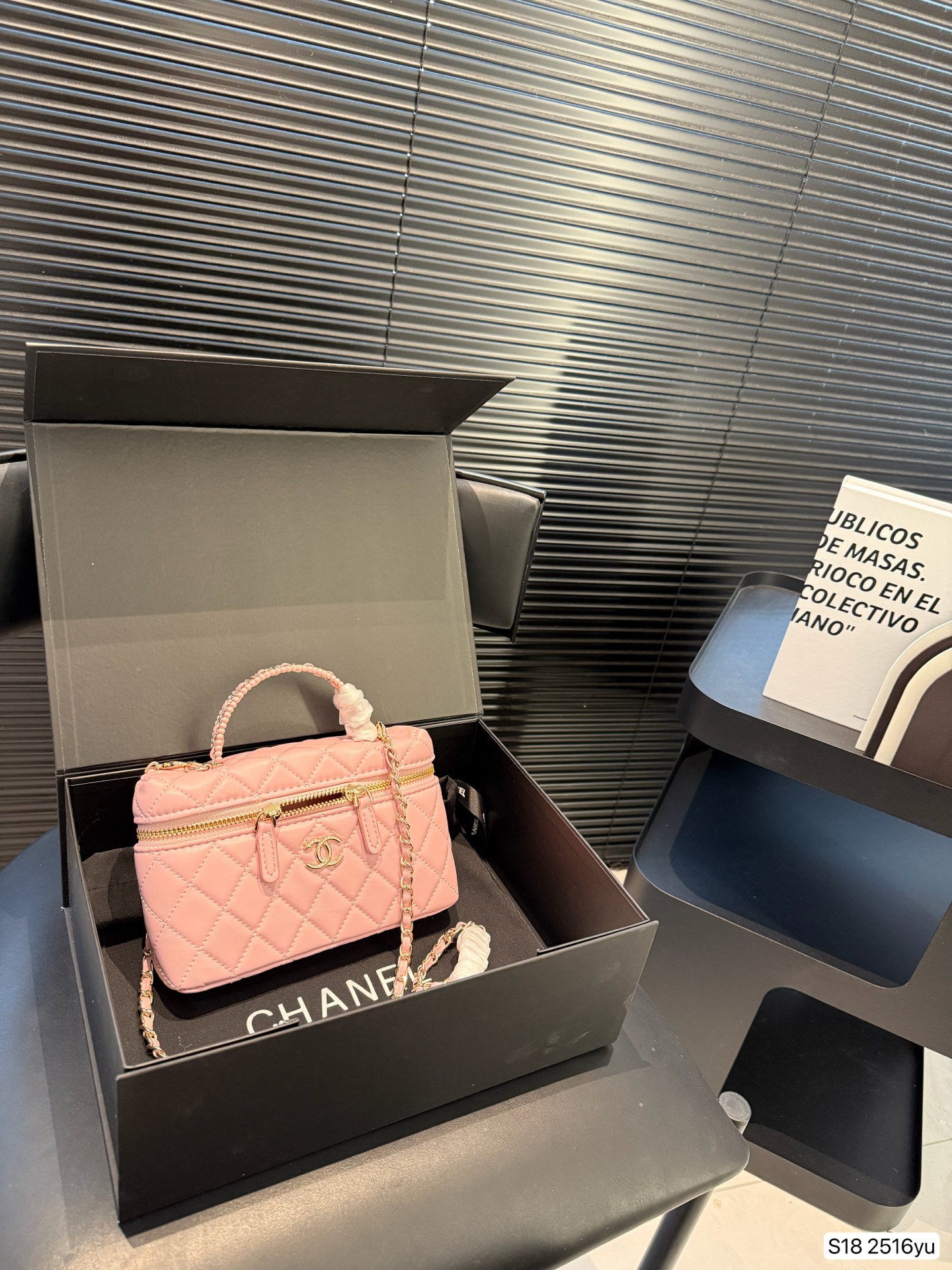 Chanel hand-held cosmetic bag