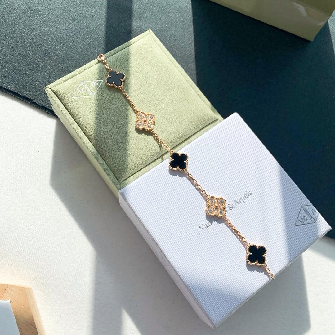 Van Cleef & Arpels yellow gold and black onyx diamond flower bracelet