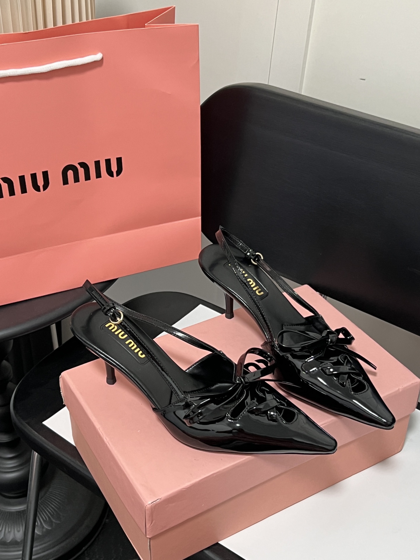 Miu Miu high-heeled sandals with bows