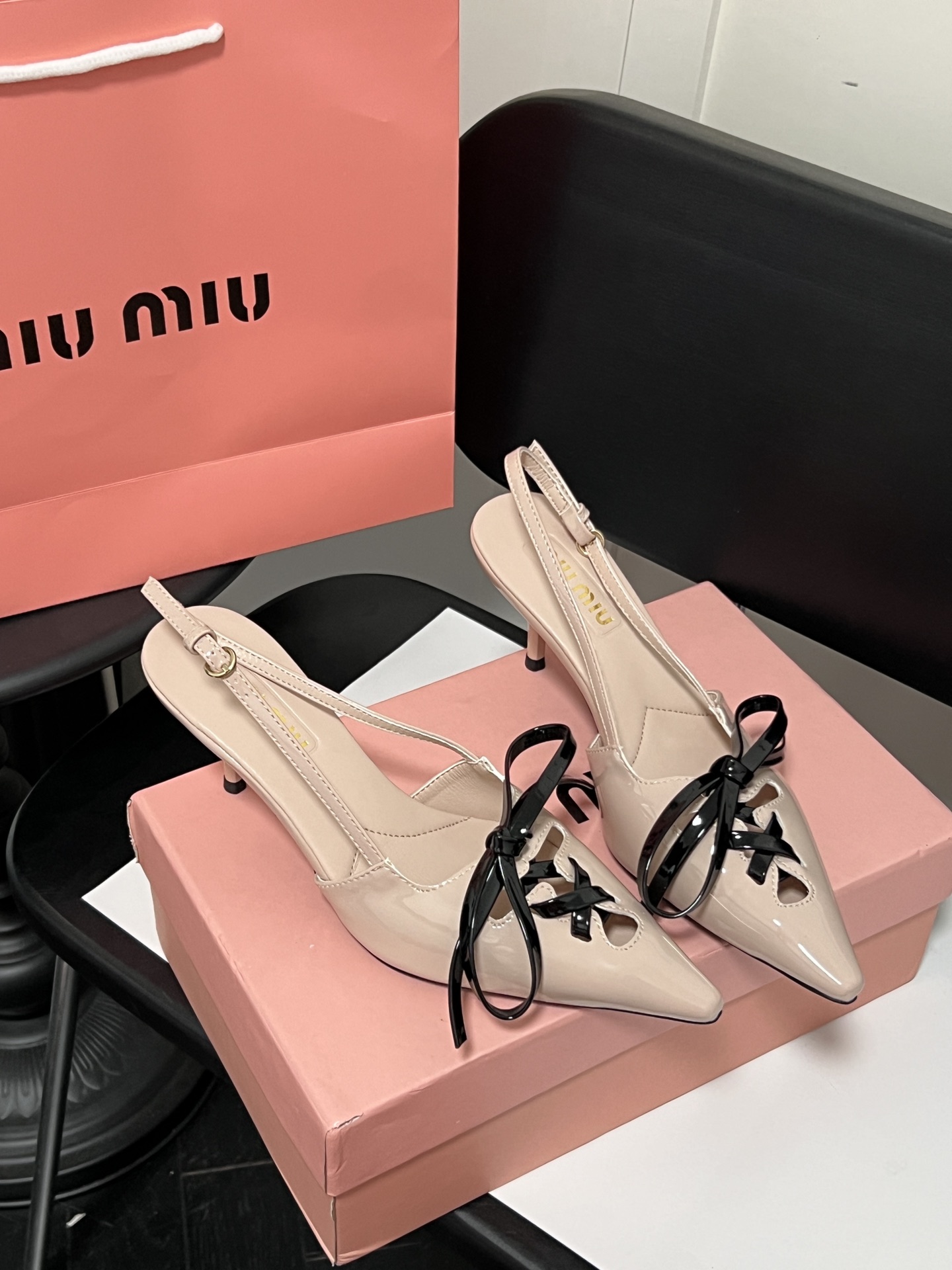 Miu Miu high-heeled sandals with bows