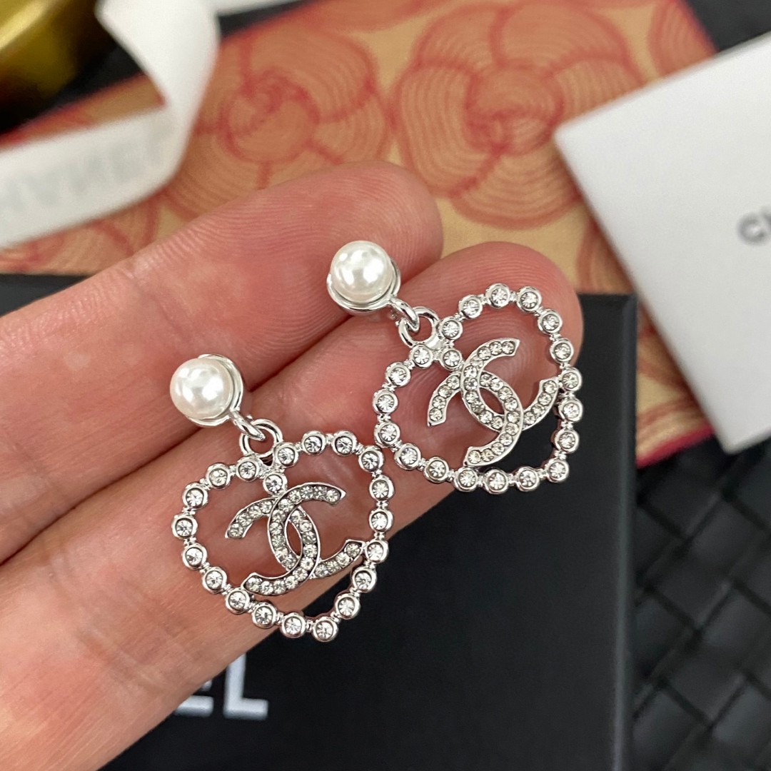 Chanel hollow heart pearl letter earrings