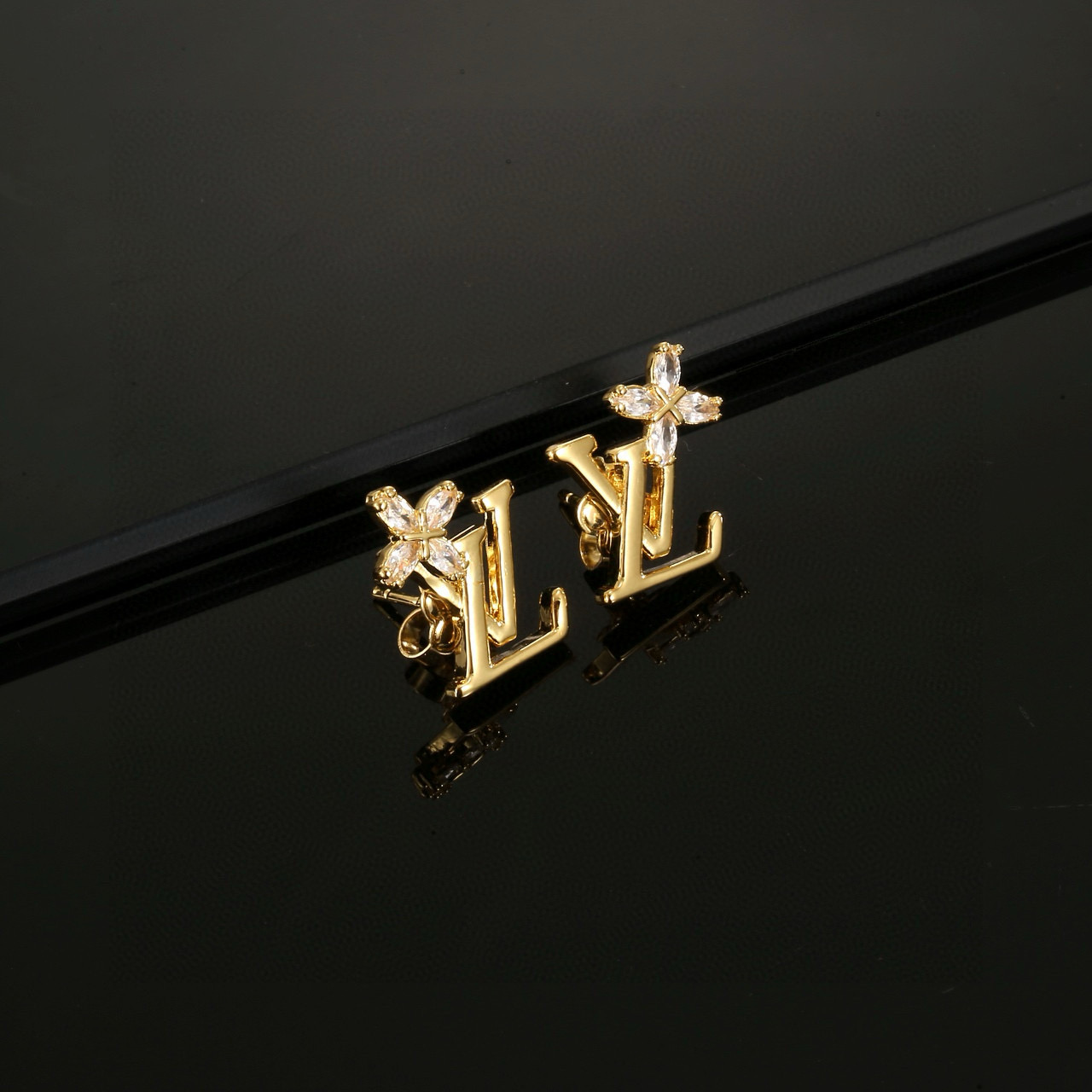 Louis Vuitton's classic letter stud earrings