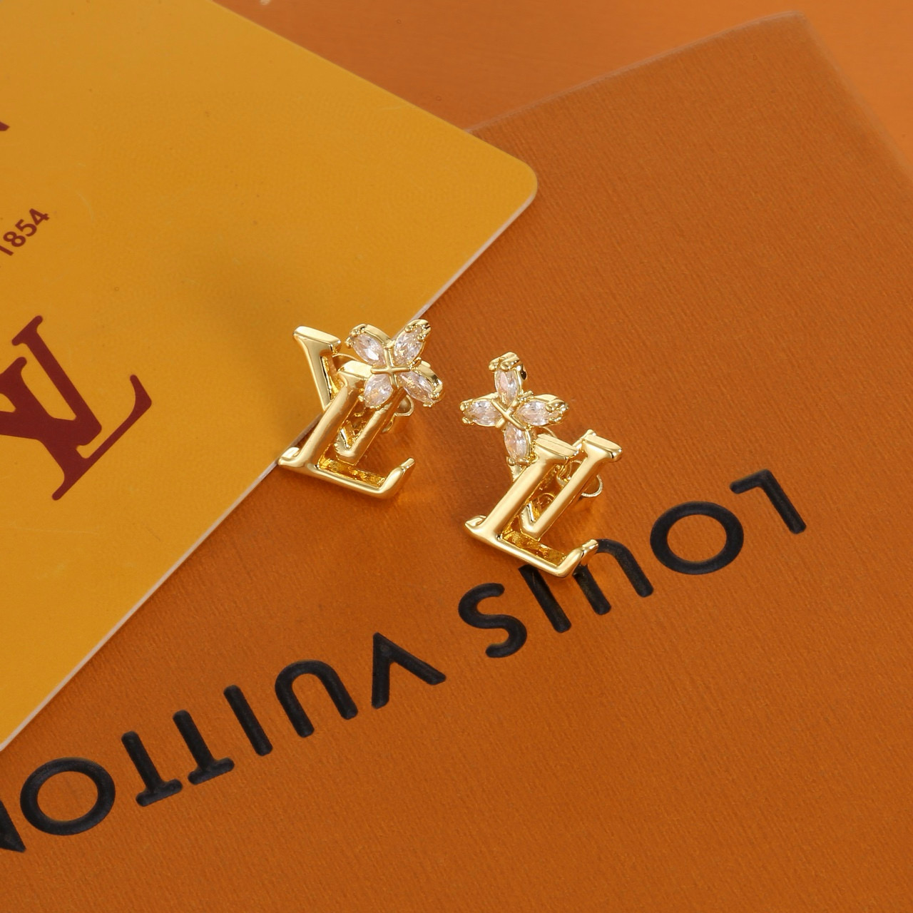 Louis Vuitton's classic letter stud earrings
