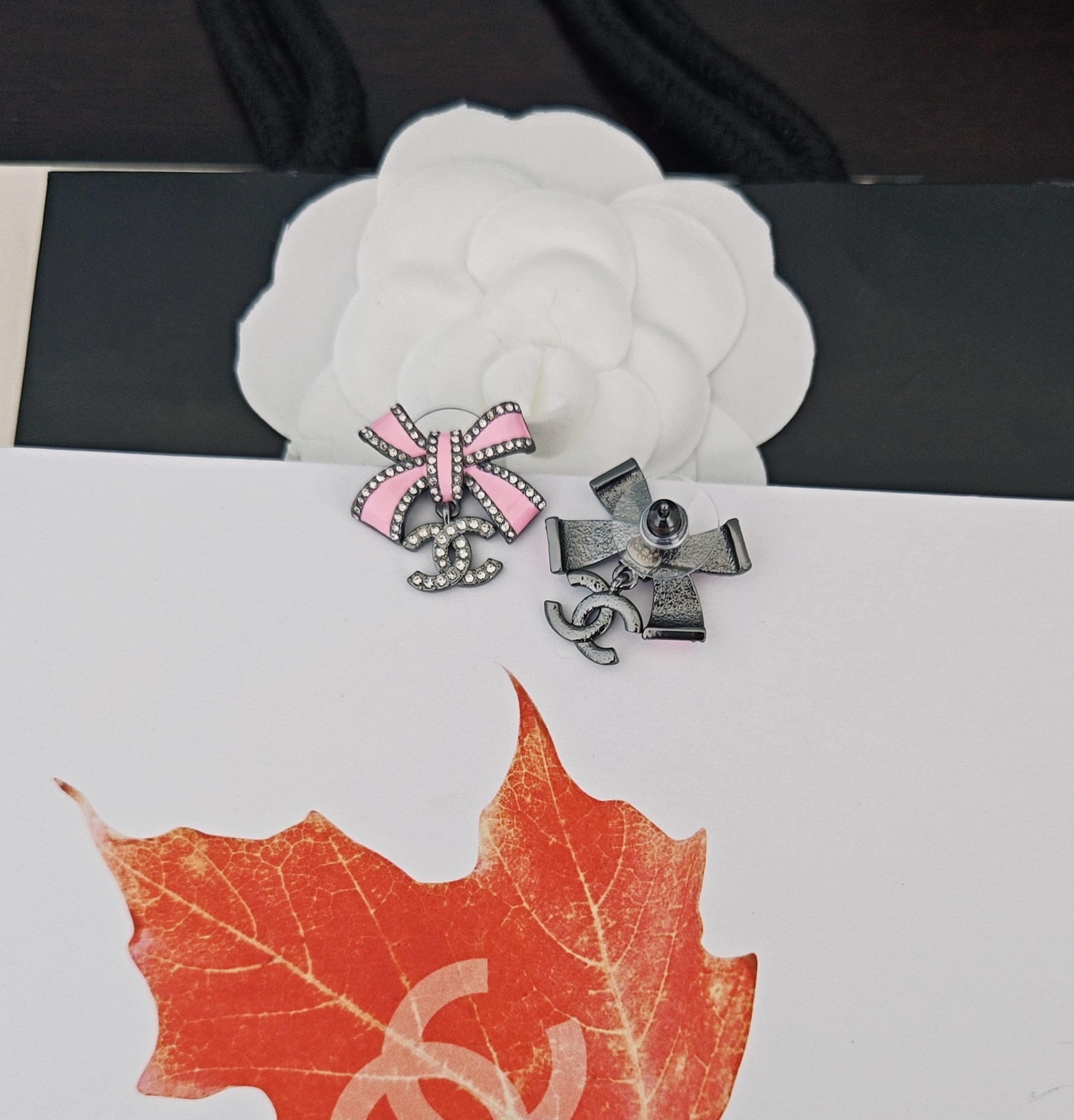 Chanel black and pink bow earrings