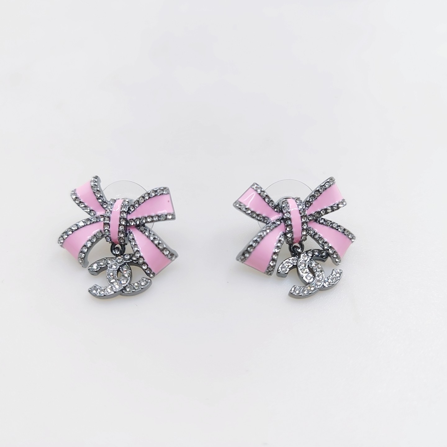 Chanel black and pink bow earrings