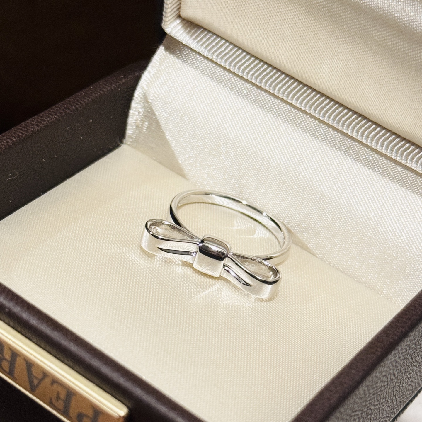 Bow-knot polished ring