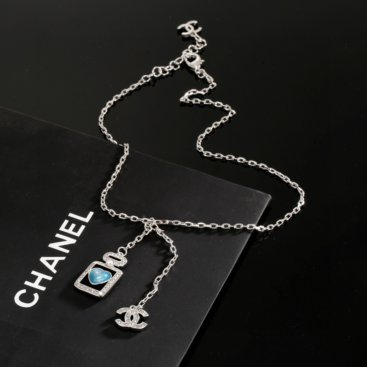 Chanel Blue Heart Perfume Bottle Necklace