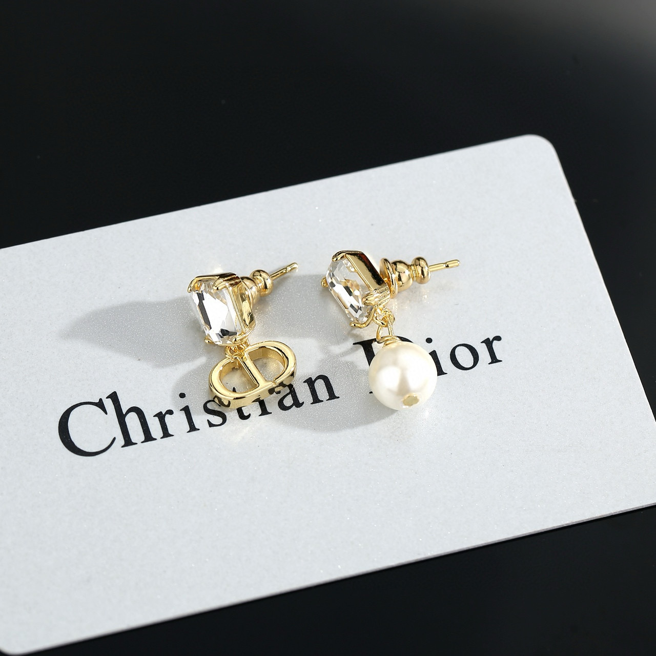 Dior asymmetrical pearl earrings