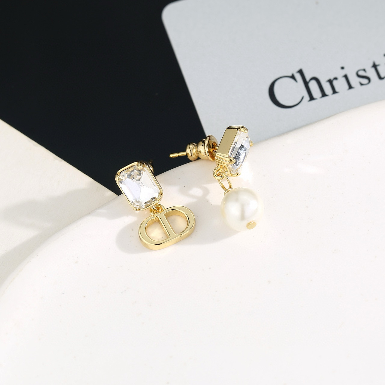 Dior asymmetrical pearl earrings