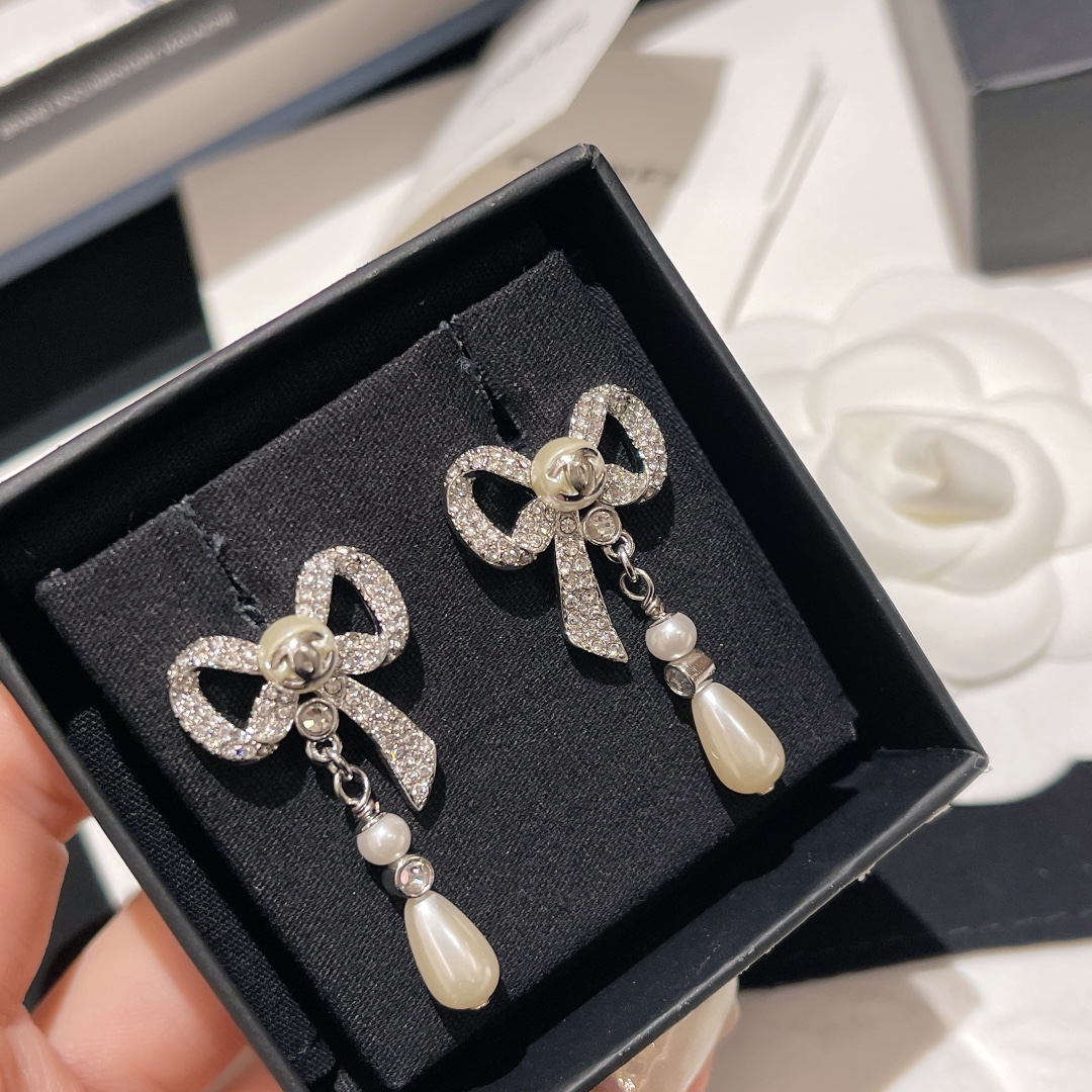 Chanel diamond bow earrings