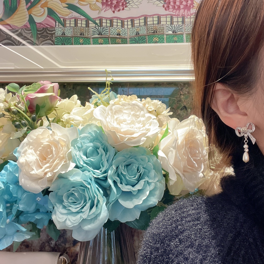 Chanel diamond bow earrings