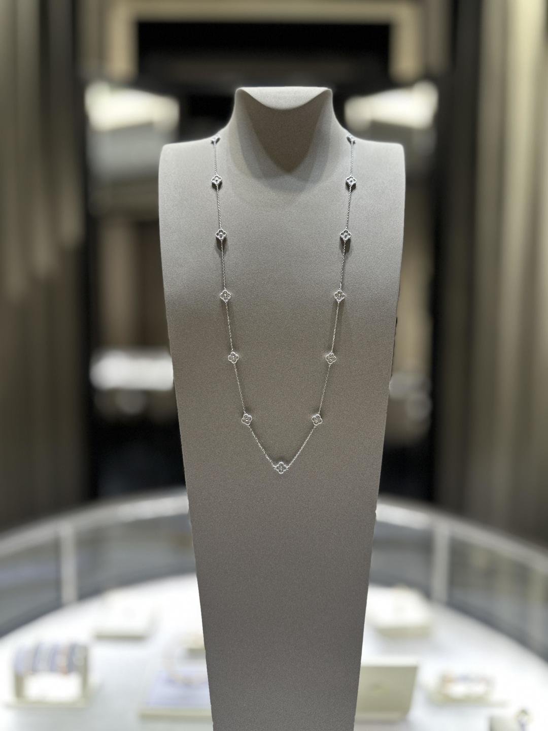 Van Cleef & Arpels white gold 16 flower mini diamond necklace