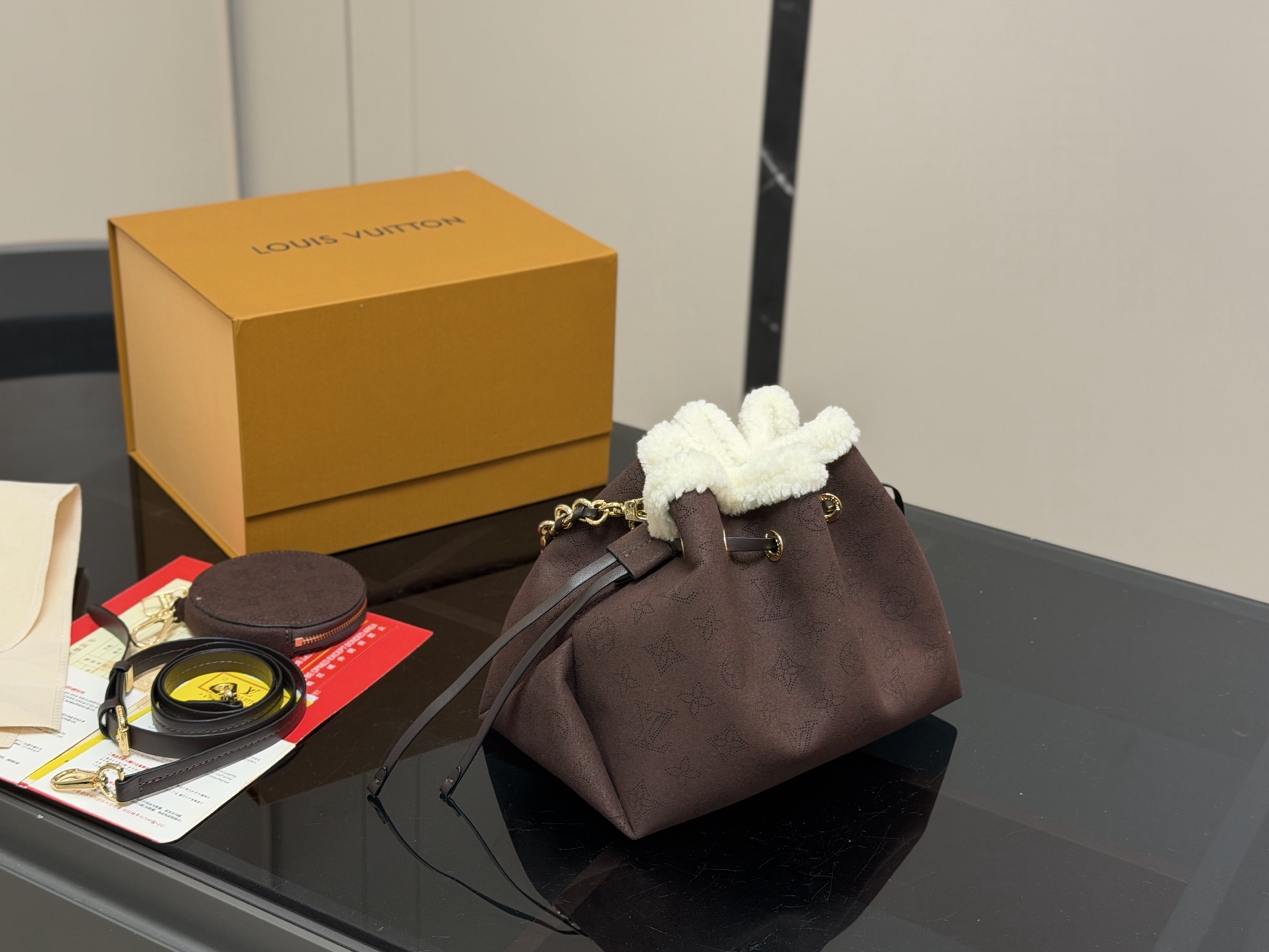 LV Bella suede bucket bag