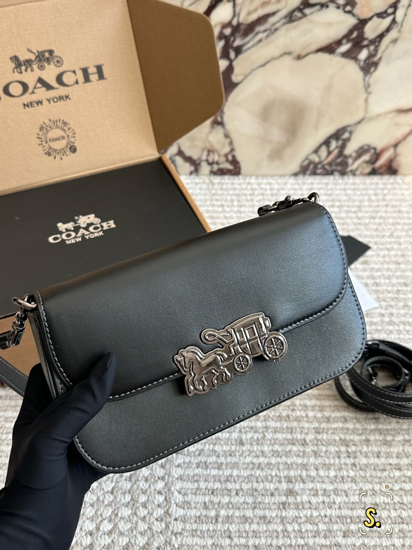 Coach's new small square bag