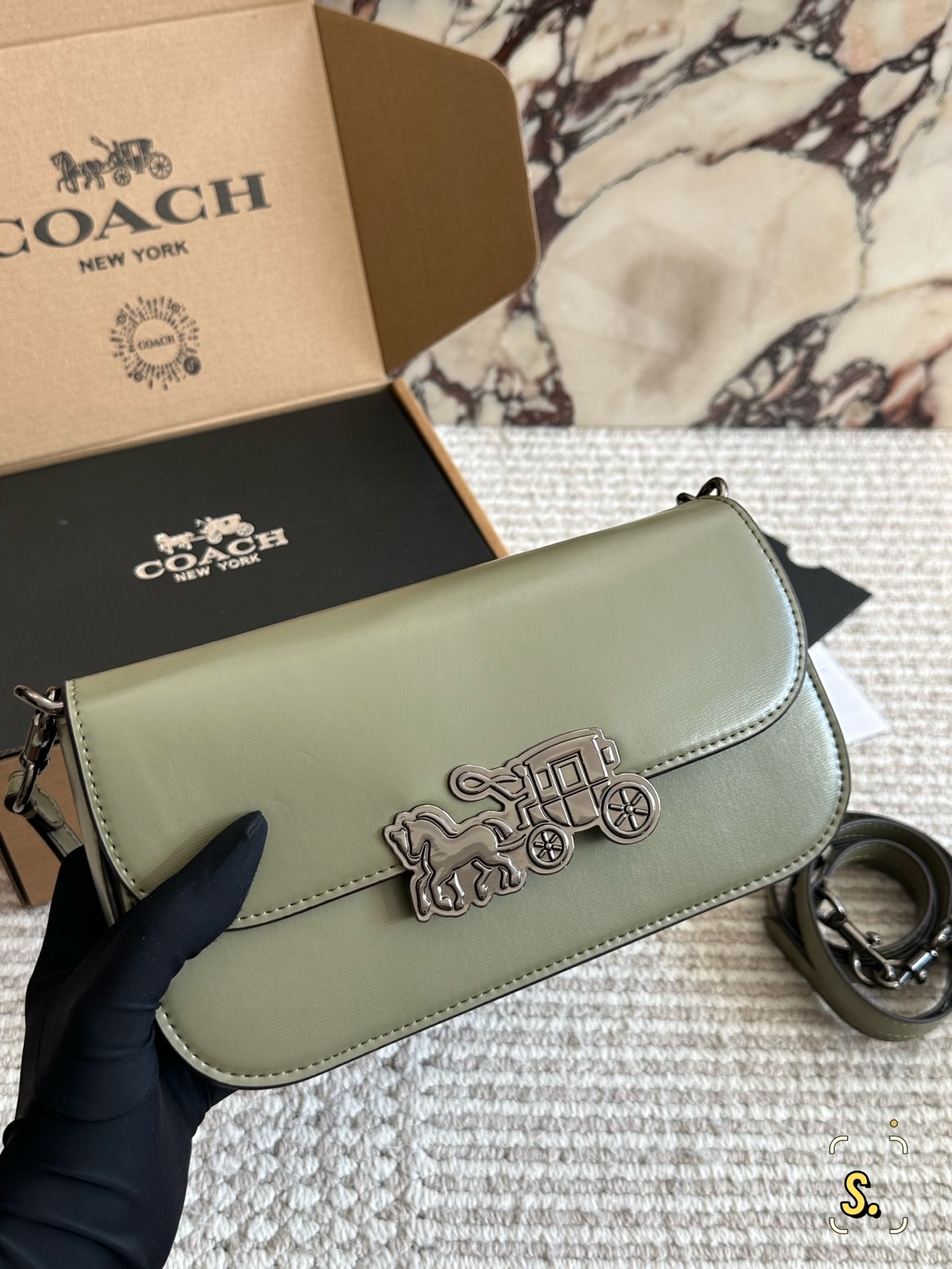 Coach's new small square bag